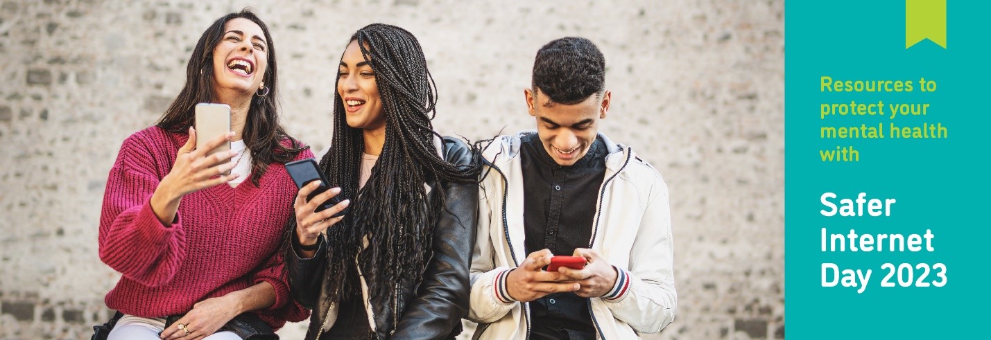 Three young people hold their smartphones and laugh together; text reads, "Resources to protect your mental health with Safer Internet Day 2023."