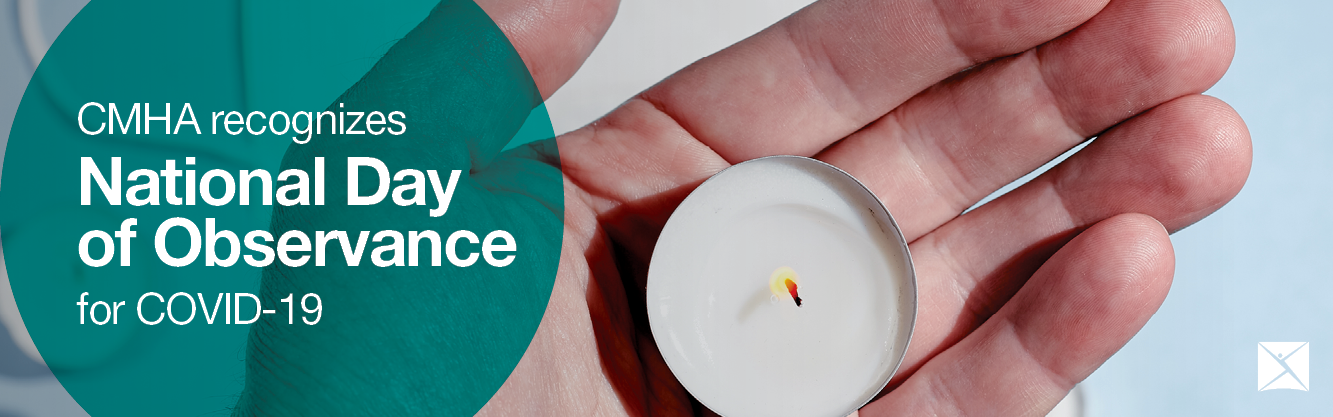 A hand holds a candle, text reads CMHA recognizes National Day of Observance for COVID-19